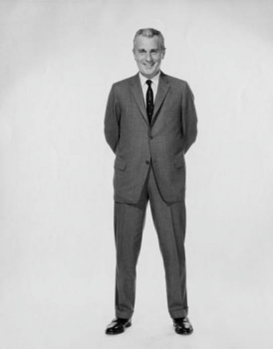 Posterazzi Portrait of businessman smiling with his hands behind back Canvas Art - (24 x 36)
