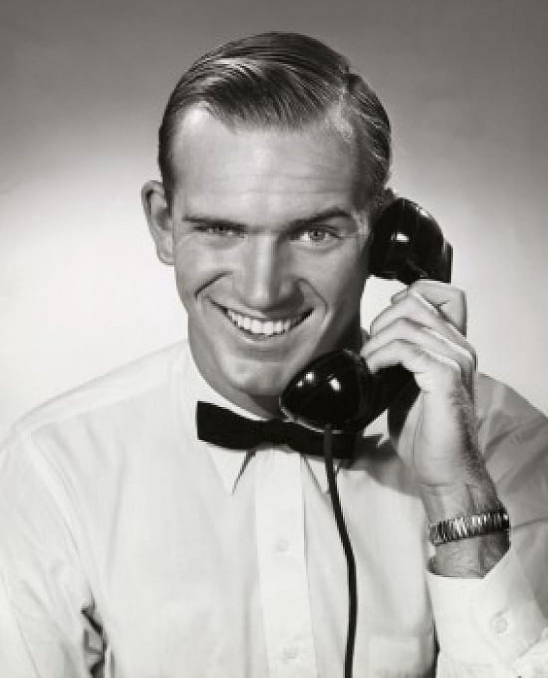 Posterazzi Portrait of businessman talking on telephone Canvas Art - (24 x 36)