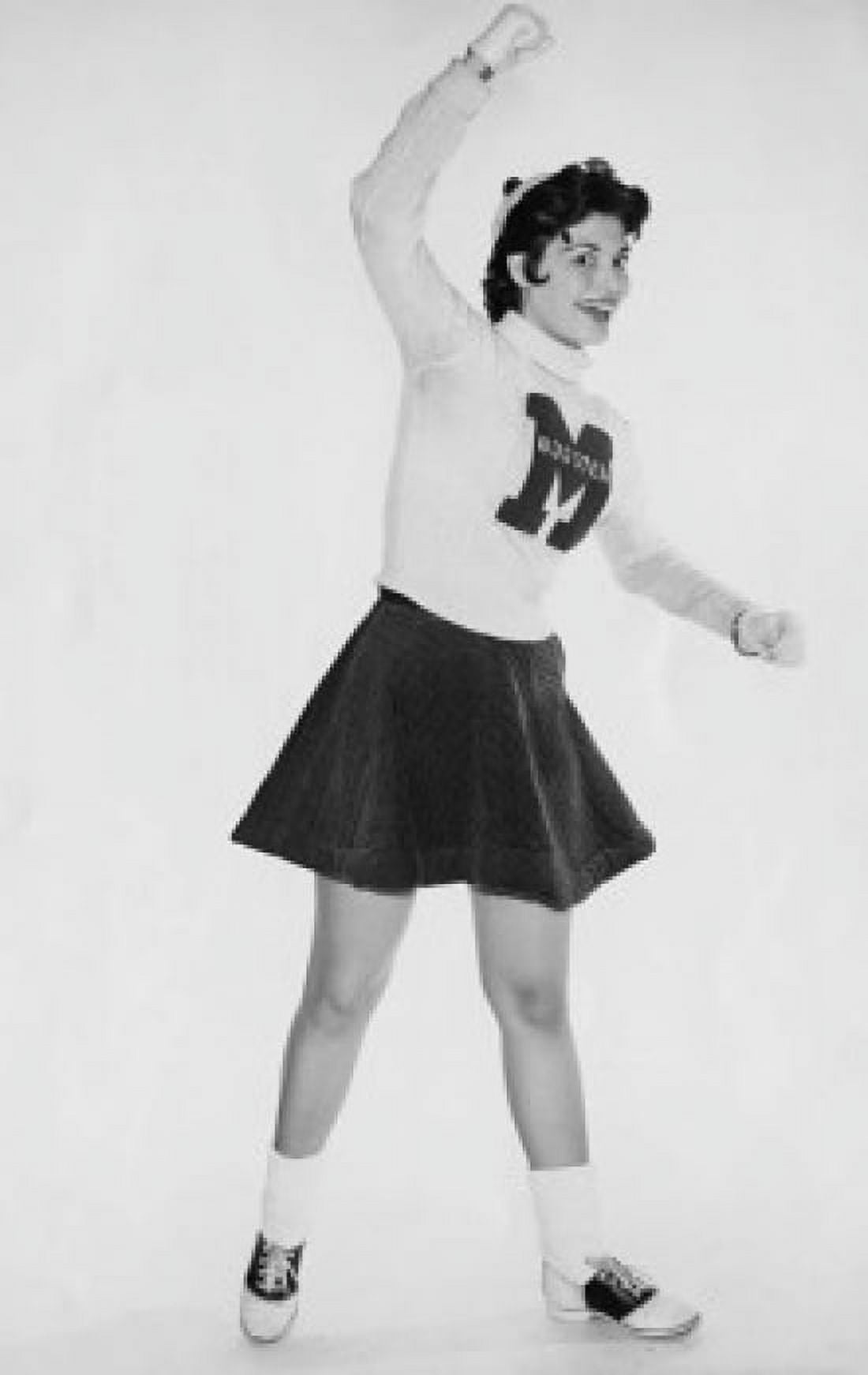 Posterazzi Portrait of female cheerleader standing and smiling Canvas Art - (24 x 36)