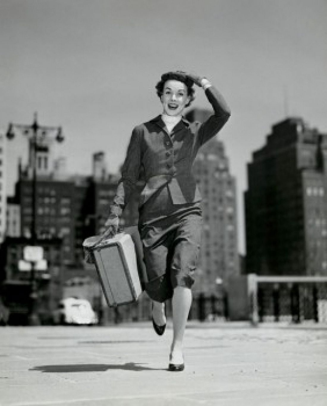 Posterazzi Portrait of young woman carrying suitcase Canvas Art - (24 x 36)
