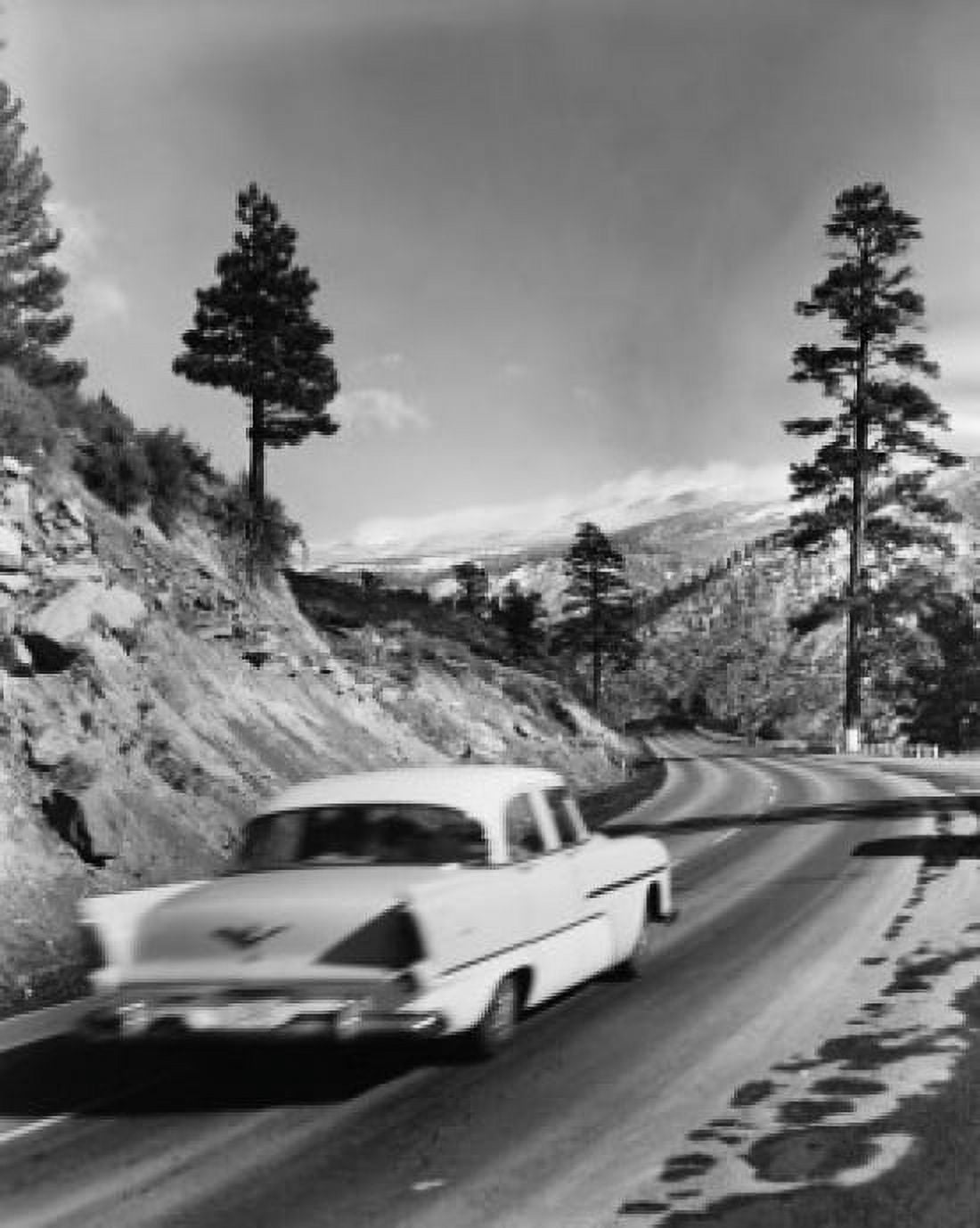 Posterazzi Rear view of a car moving on a road Canvas Art - (24 x 36)