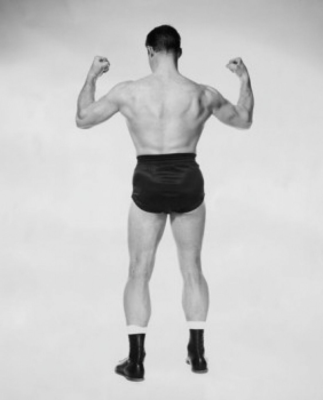 Posterazzi Rear view of a male body builder flexing his muscles Canvas Art -  (24 x 36)