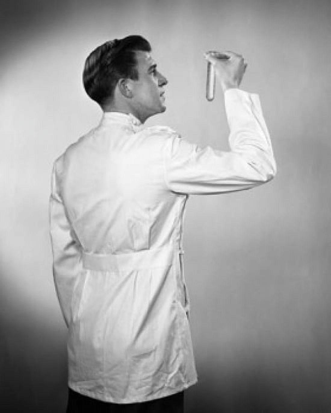 Posterazzi Rear view of a male scientist examining a test tube Canvas Art - (24 x 36)