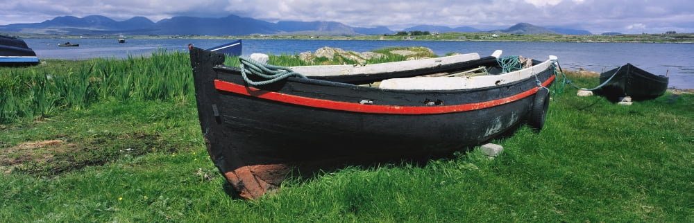 Posterazzi Roundstone Connemara Co Galway Ireland Currach On The Shore Canvas Art - The Irish Image Collection Design Pics (44 x 14)