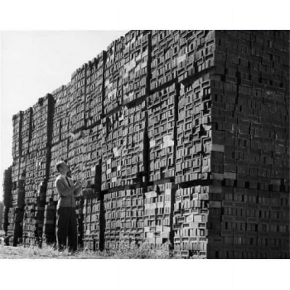 Posterazzi SAL25536988 Man Examining Bricks in a Brickyard Poster Print - 18 x 24 in.