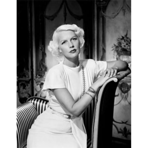 Posterazzi SAL255417969 Mid Adult Woman Sitting in Elegant Chair Poster Print - 18 x 24 in.