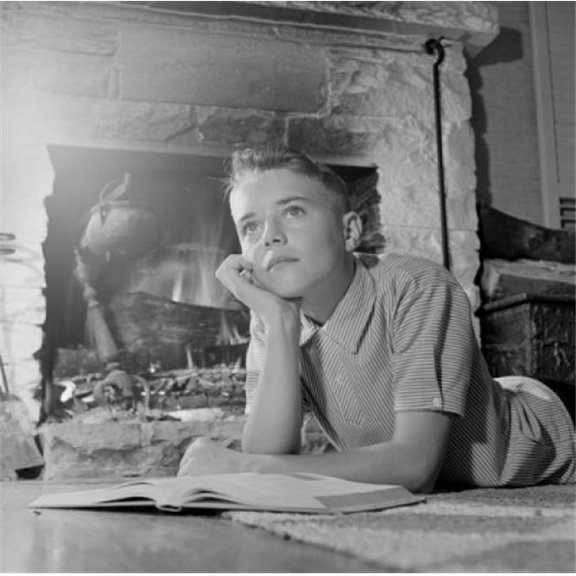 Posterazzi SAL255421101 Contemplating Boy with Book by Fireplace Poster Print - 18 x 24 in.