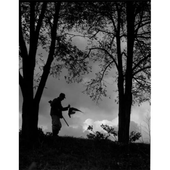 Posterazzi SAL255421925 Silhouette of Man with Gun Going for Hunting Poster Print - 18 x 24 in.