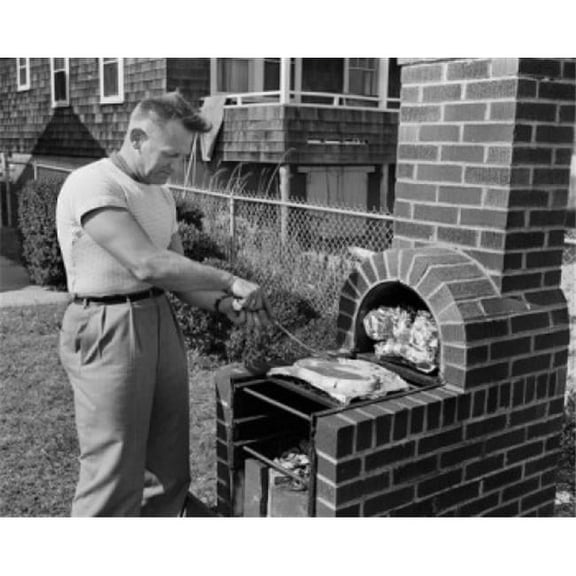 Posterazzi SAL255422742 Man Cooking Barbecue Poster Print - 18 x 24 in.