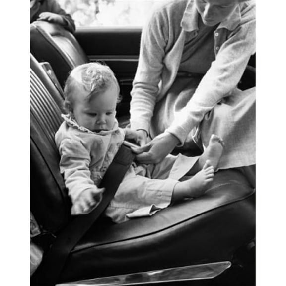 Posterazzi SAL25544598 Mid Adult Woman Fastening Her Daughters Car Seat Belt Poster Print - 18 x 24 in.