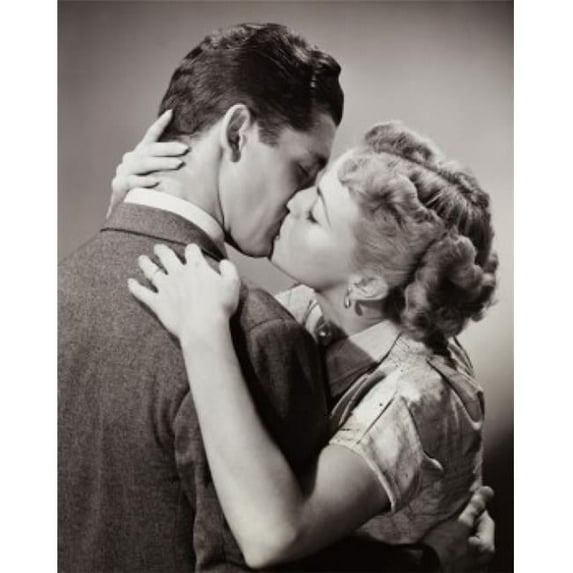 Posterazzi SAL2555589 Side Profile of a Young Couple Kissing Poster Print - 18 x 24 in.