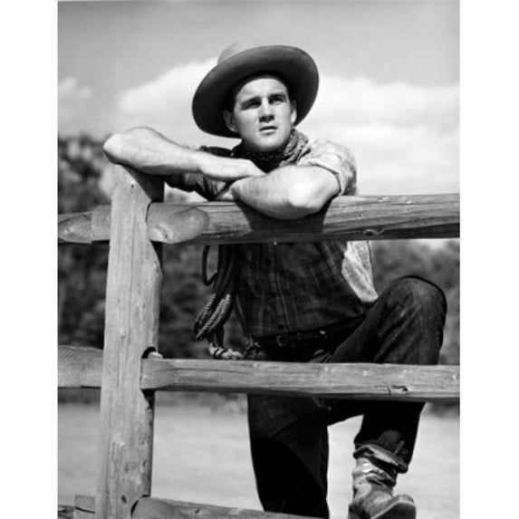 Posterazzi SAL2557586 Cowboy Leaning on Fence Poster Print - 18 x 24 in.