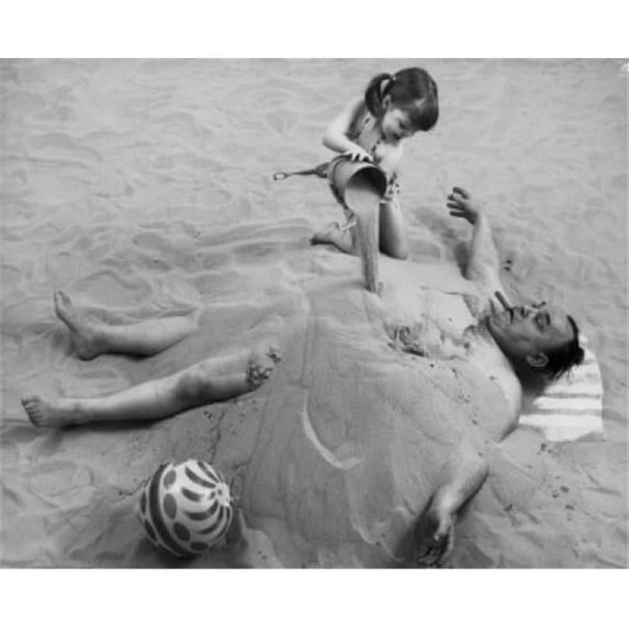 Posterazzi SAL2557994 High Angle View of a Girl Burying Her Father in Sand on the Beach Poster Print - 18 x 24 in.