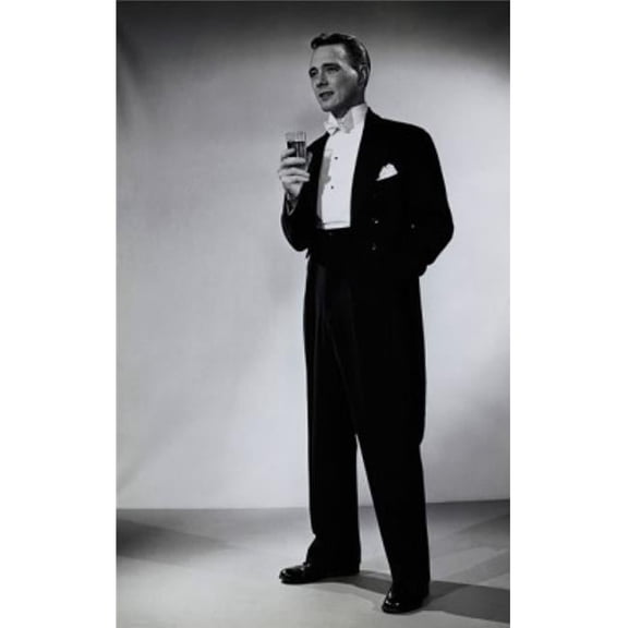 Posterazzi SAL2559417 Young Man Standing & Holding a Glass Poster Print - 18 x 24 in.