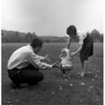 thumbnail image 1 of Posterazzi SAL2559767 Mother & Father Learning Baby Girl How to Walk Poster Print - 18 x 24 in., 1 of 1