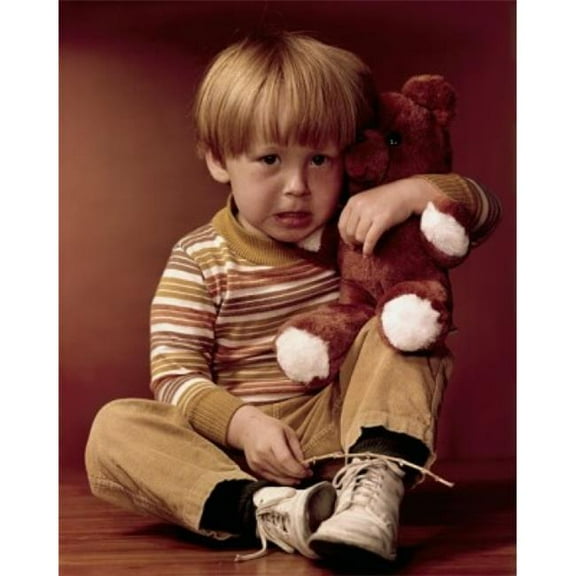 Posterazzi SAL3811362903 Portrait of a Boy Holding a Teddy Bear & Looking Displeased Poster Print - 18 x 24 in.