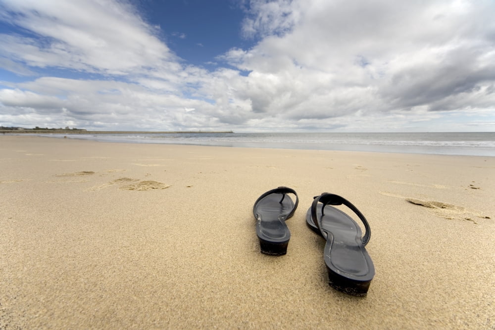 Posterazzi Sandals On The Beach Canvas Art - John Short Design Pics (34 x 22)