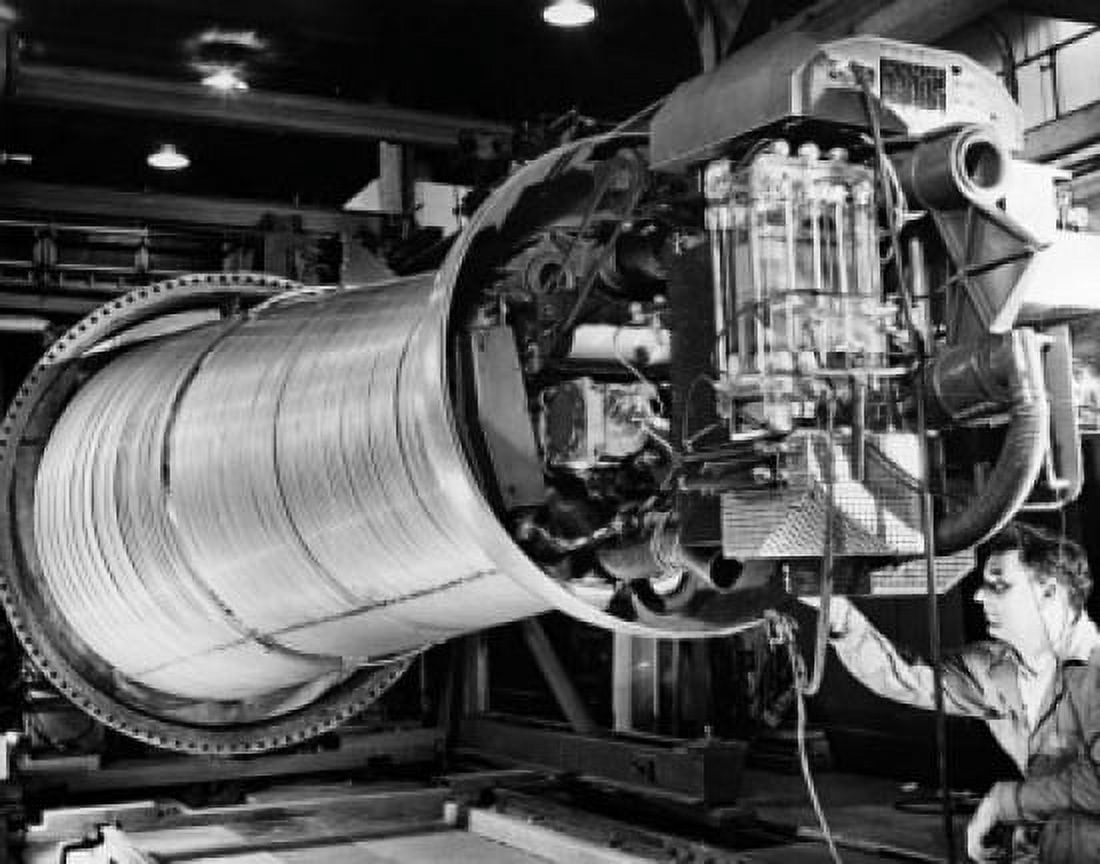 Posterazzi Scientist inspecting a Van de Graaf linear accelerator in a laboratory Lawrence Berkeley National Laboratory University of California Berkeley California USA Canvas Art - (24 x 36)