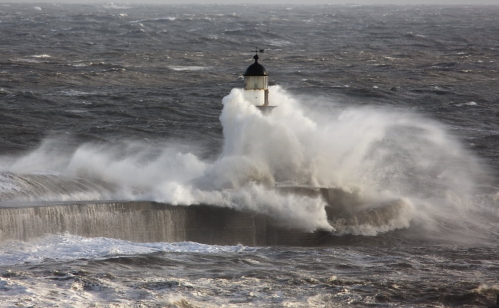 Posterazzi Seaham Teesside England Waves Crashing On A Lighthouse In The Ocean Canvas Art - John Short Design Pics (38 x 24)