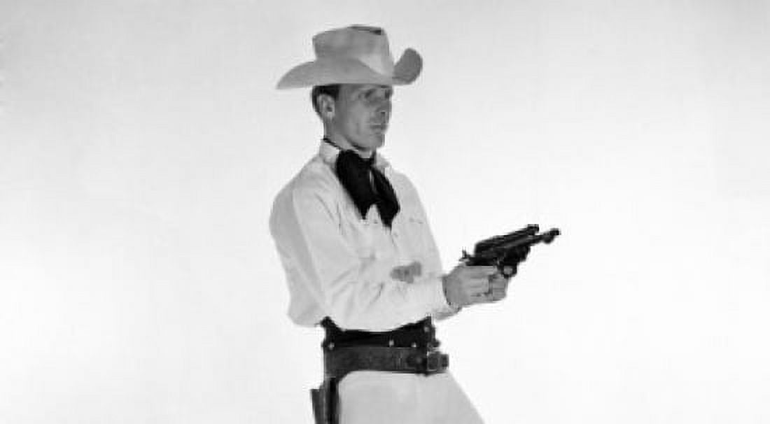 Posterazzi Side profile of a cowboy holding two pistols Canvas Art - (24 x 36)