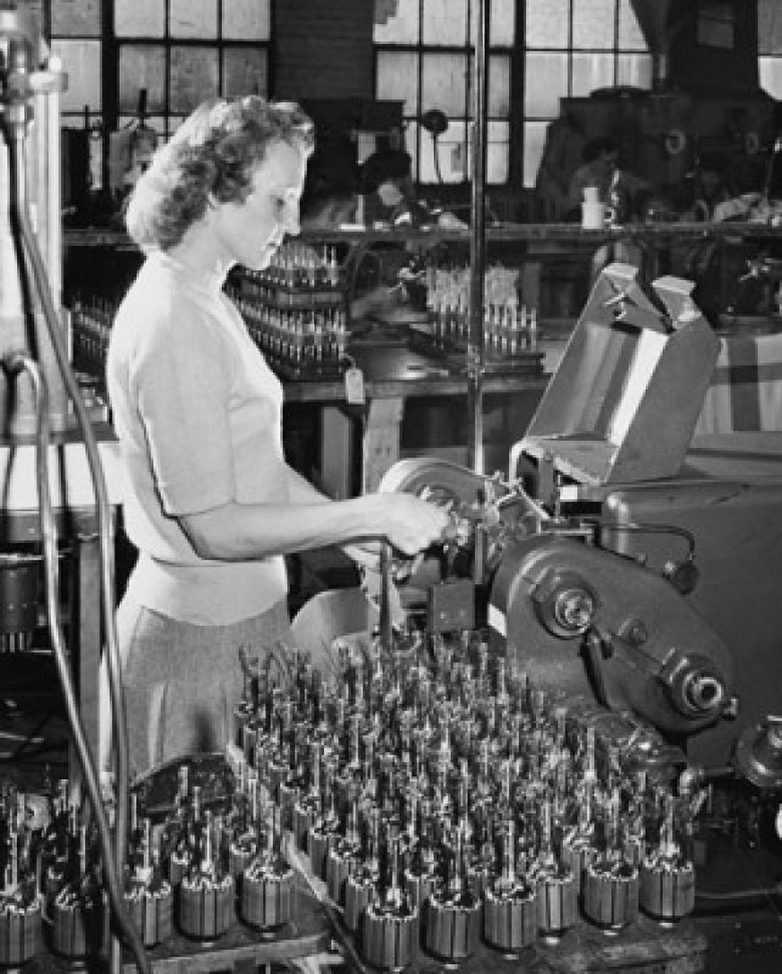 Posterazzi Side profile of a mid adult woman working on a winding machine Canvas Art -  (24 x 36)