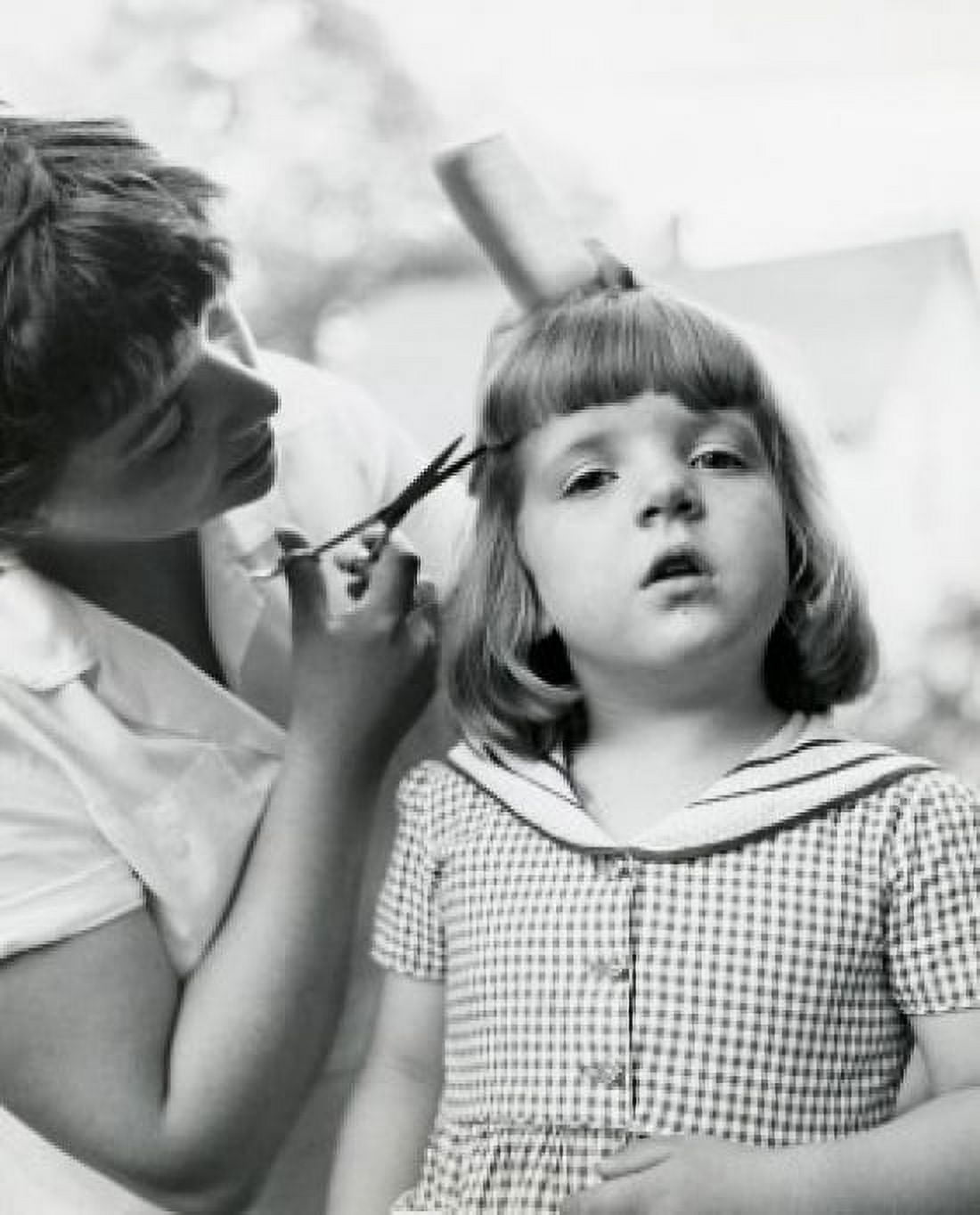 Posterazzi Side profile of a mother cutting her daughters hair Canvas Art -  (24 x 36)