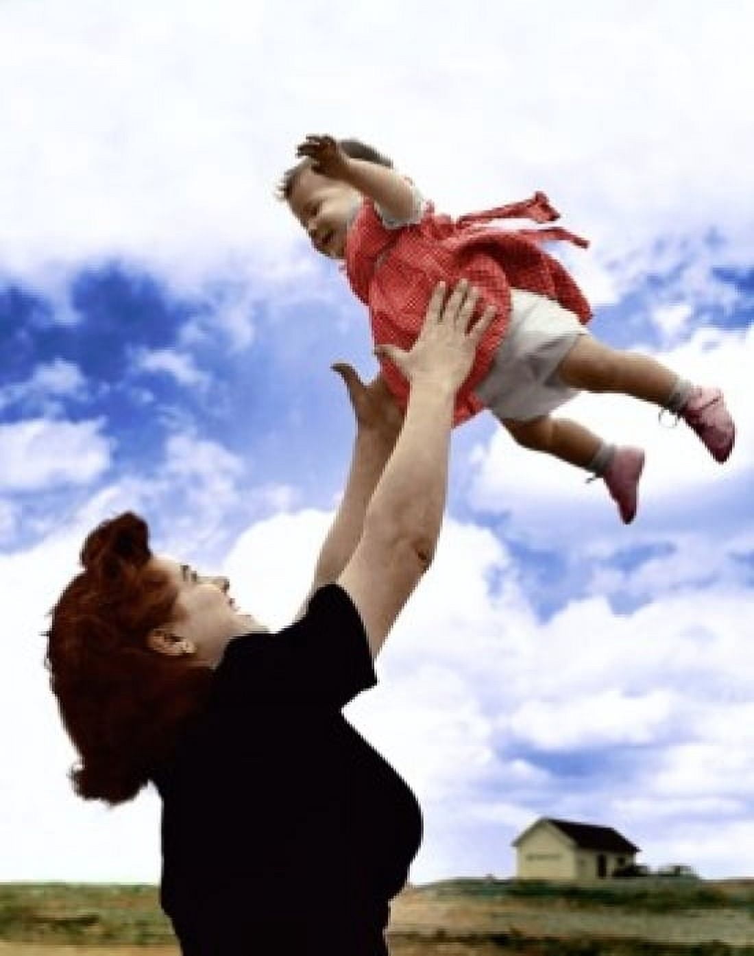 Posterazzi Side profile of a mother tossing her daughter in the air Canvas Art - (24 x 36)