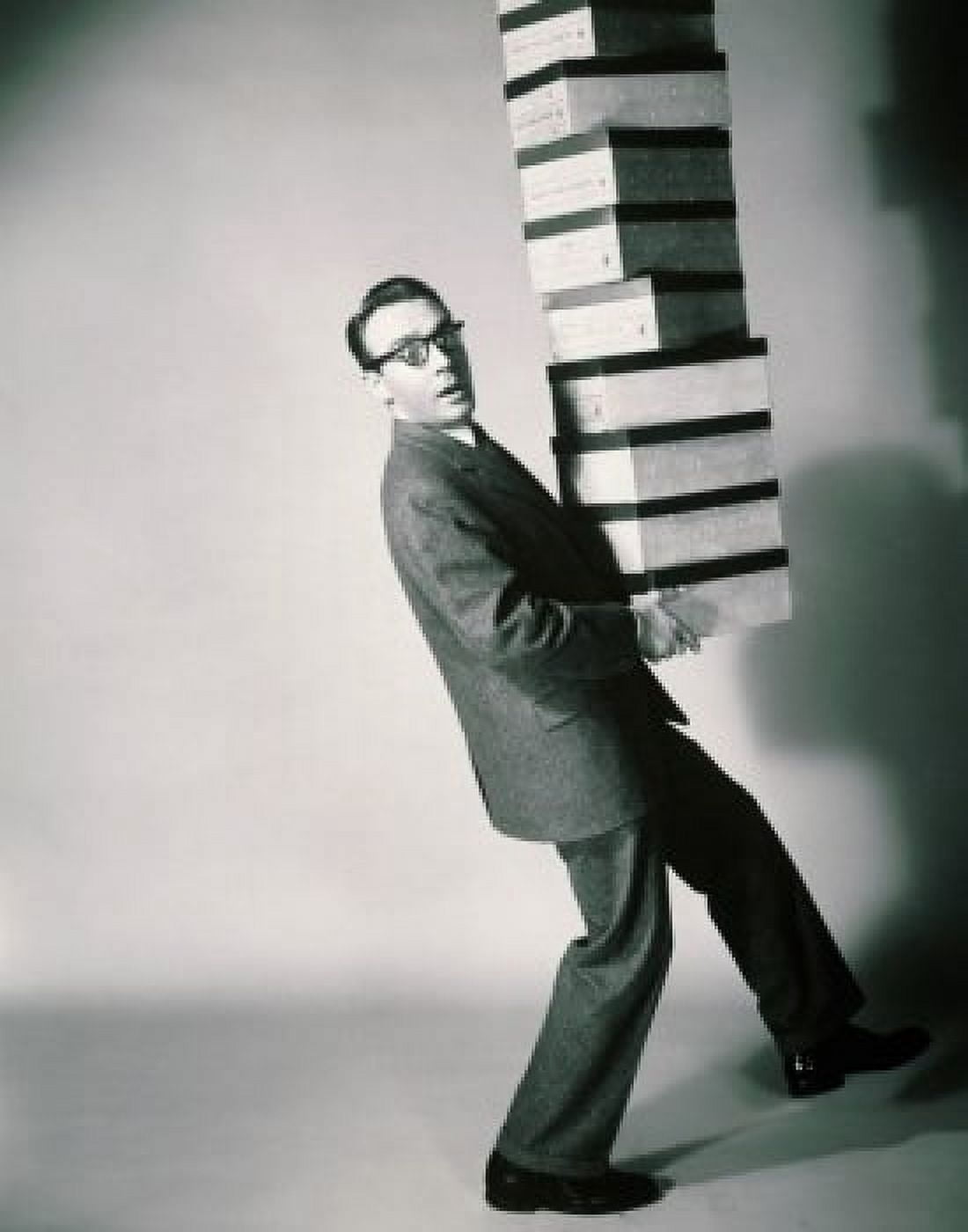 Posterazzi Side profile of a salesman carrying a stack of shoeboxes Canvas Art -  (24 x 36)