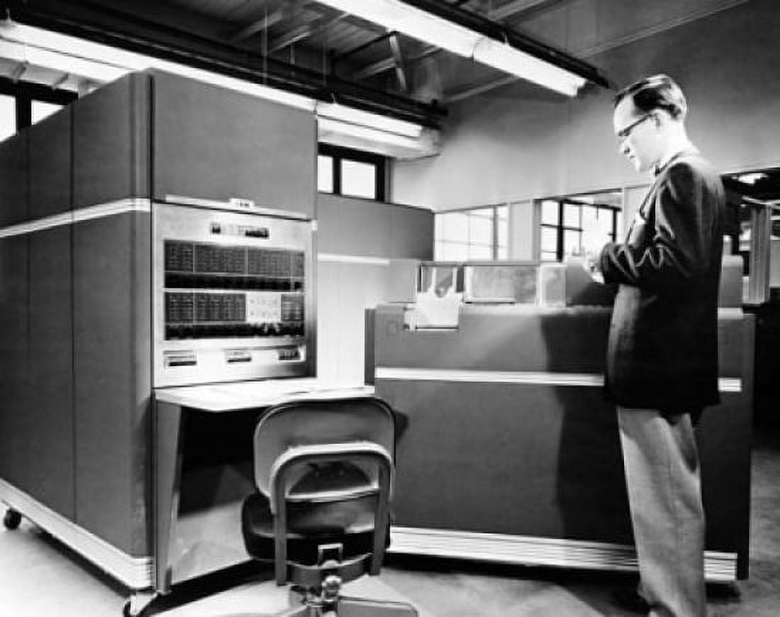 Posterazzi Side profile of a technician standing in front of a computer Canvas Art - (24 x 36)