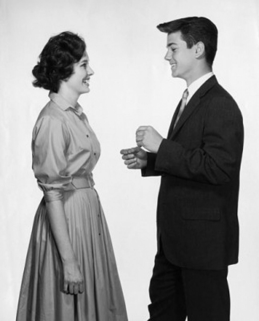 Posterazzi Side profile of a teenage couple standing face to face and smiling Canvas Art - (24 x 36)