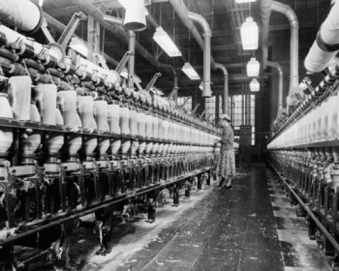 Posterazzi Side profile of a woman working in a textile factory Canvas Art - (24 x 36)