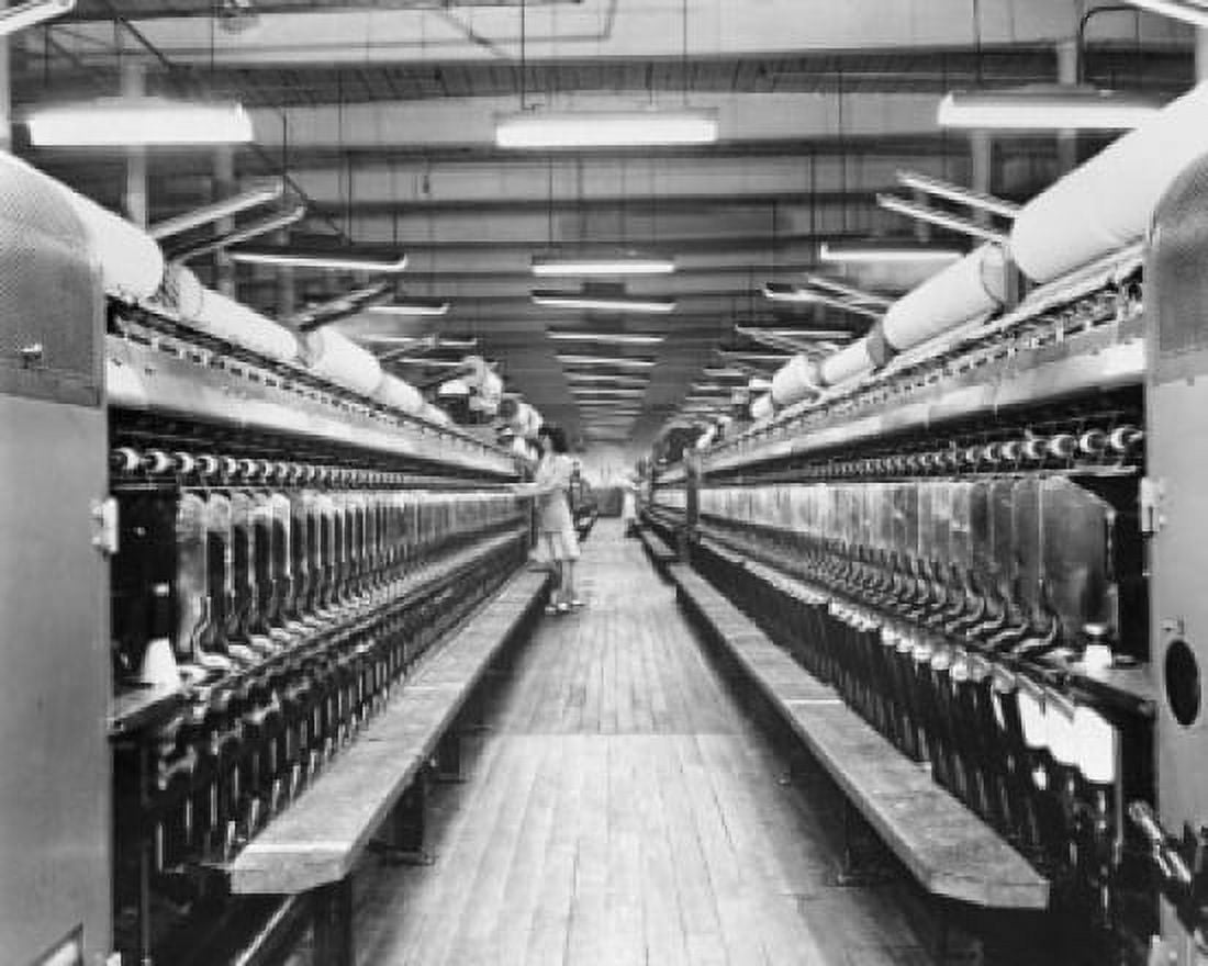 Posterazzi Side profile of a woman working on a spinning frame in a textile factory Canvas Art - (24 x 36)