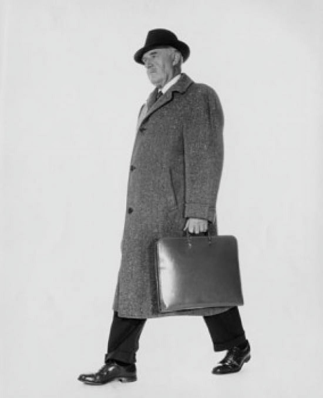 Posterazzi Side profile of businessman carrying briefcase Canvas Art - (24 x 36)