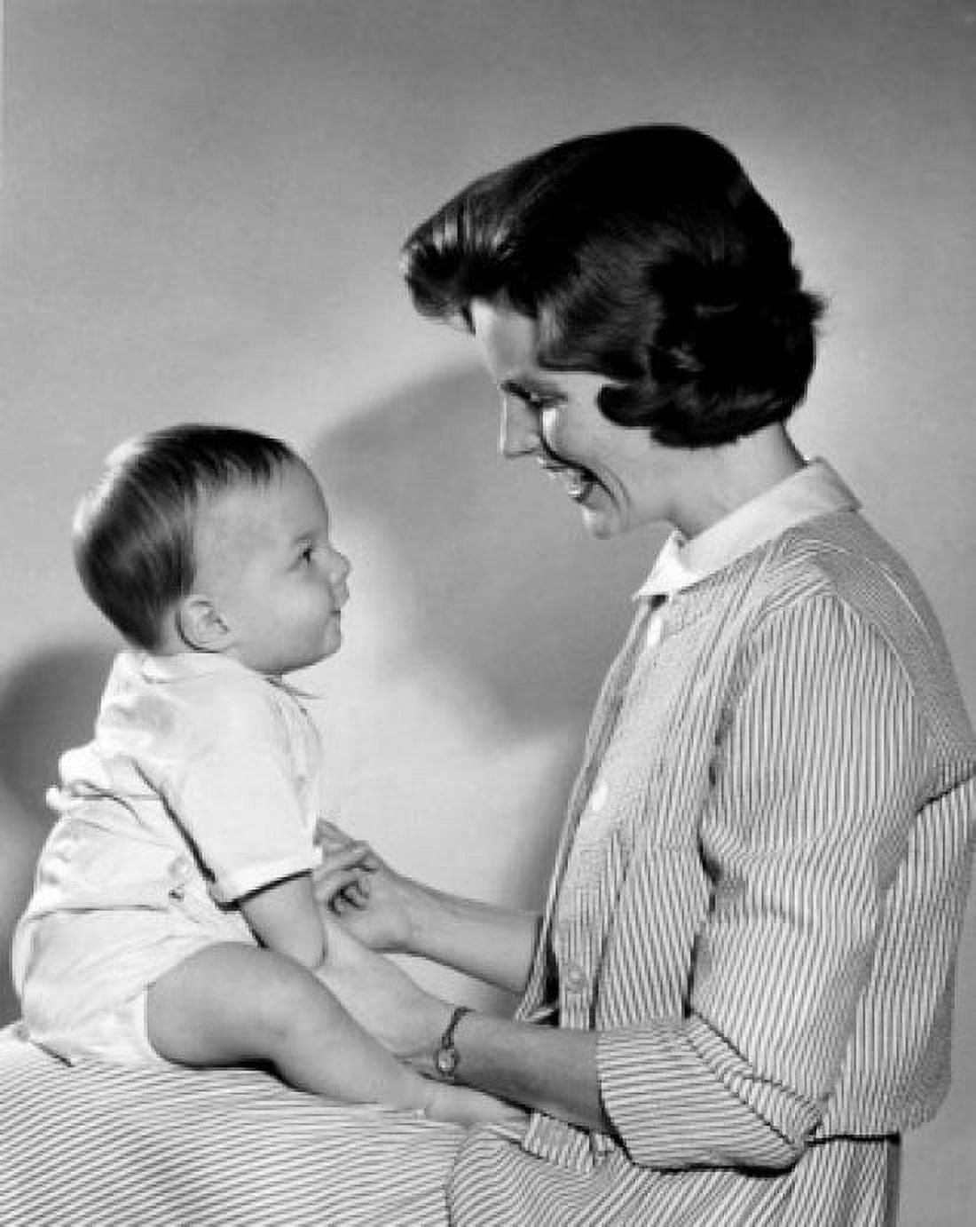 Posterazzi Side view of young woman and baby boy sitting on lap Canvas Art - (24 x 36)
