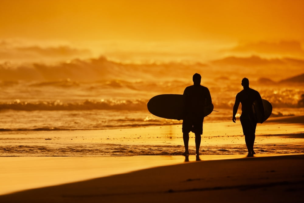 Posterazzi Silhouettes of Surfers on the Beach at Sunset Canvas Art - Design Pics Vibe Design Pics (34 x 22)