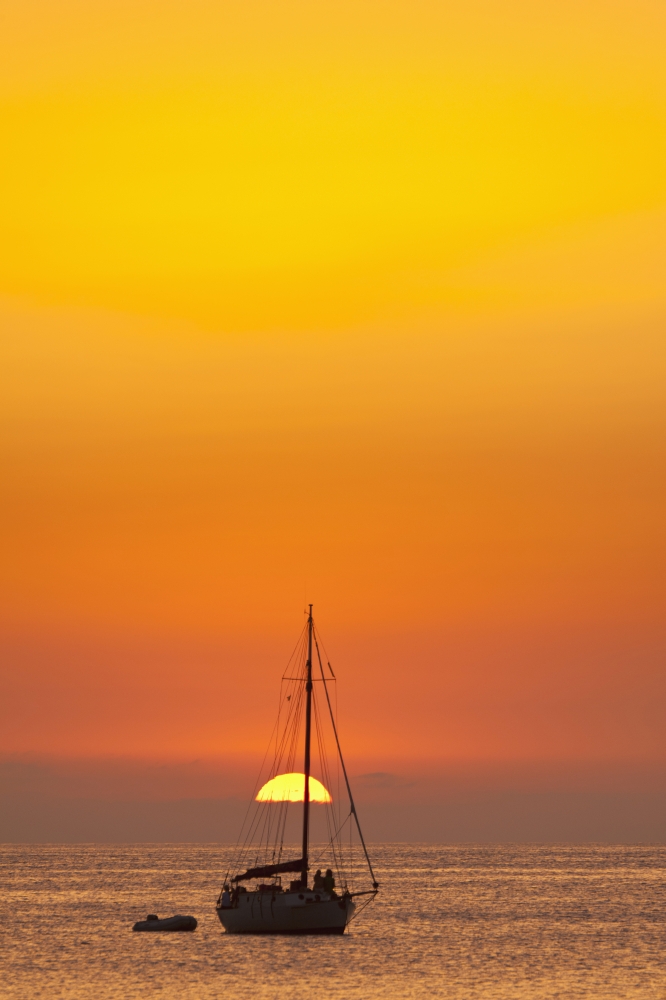 Posterazzi Spain People watching sunset from yacht moored off Benirras beach Ibiza Canvas Art - Ian Cumming Design Pics (24 x 38)