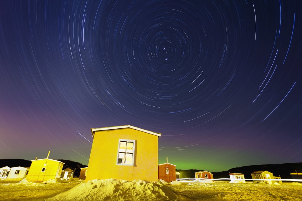 Posterazzi Star Trails And Ice Fishing Huts On Saguenay River Saguenay Lac-Saint-Jean Quebec Canada Canvas Art - Yves Marcoux Design Pics (36 x 24)