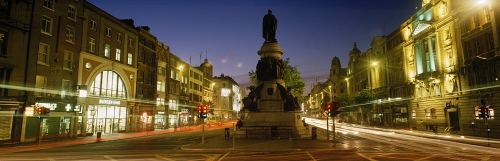 Posterazzi Statue Of A Man On A Pedestal On The Street At Dusk Oconnell Street Dublin Republic Of Ireland Canvas Art - The Irish Image Collection Design Pics (44 x 14)