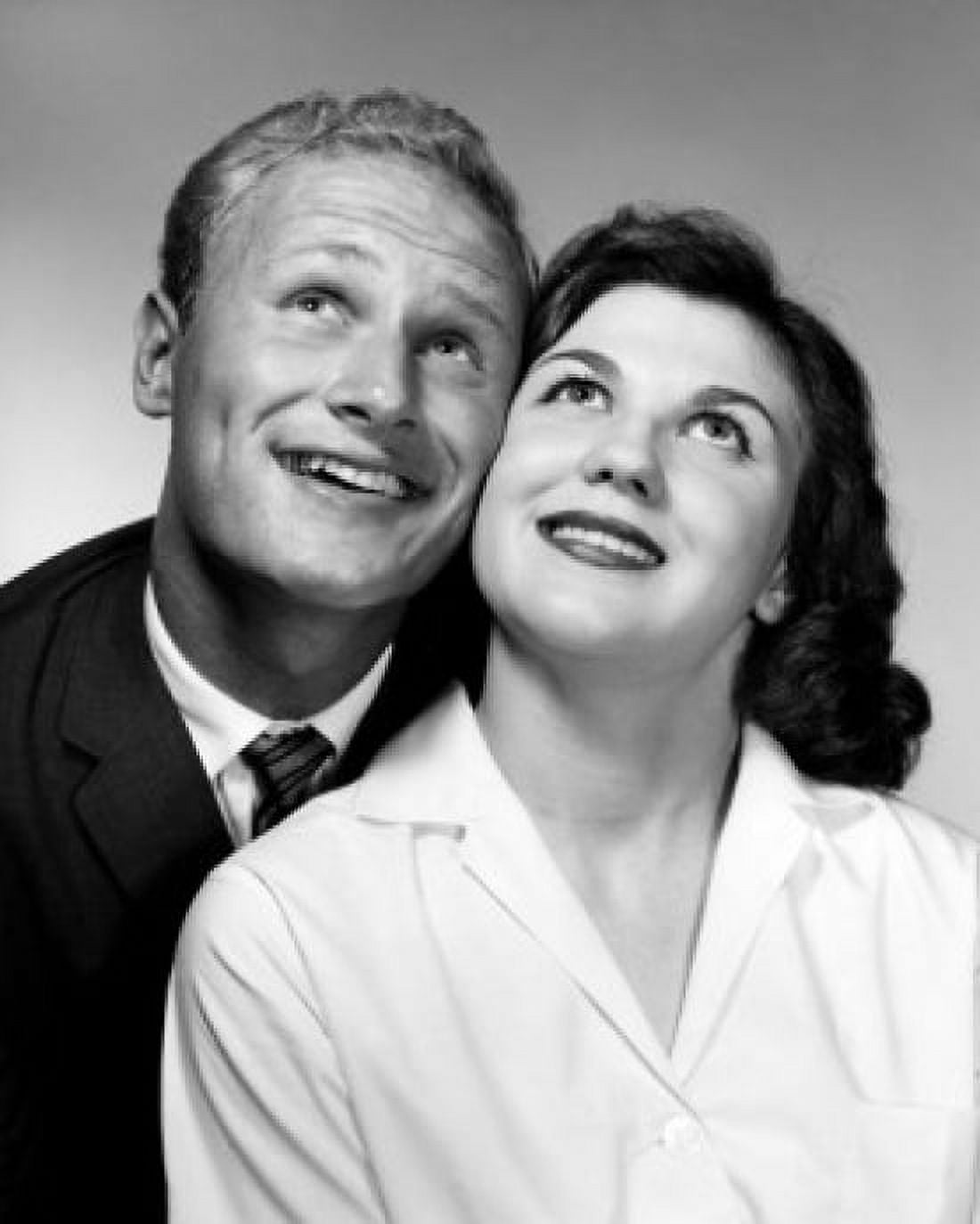 Posterazzi Studio portrait of mid adult couple looking up Canvas Art - (24 x 36)