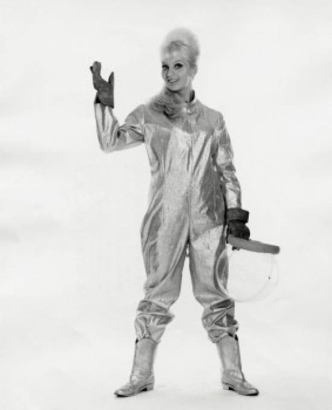 Posterazzi Studio portrait of young female astronaut holding space helmet Canvas Art -  (24 x 36)