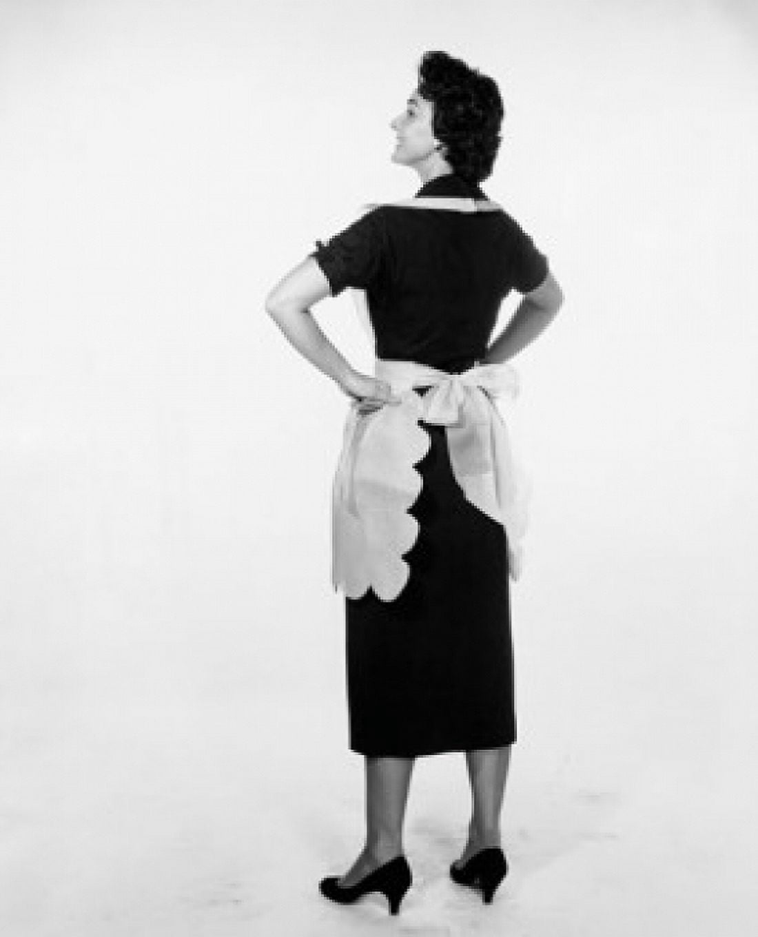 Posterazzi Studio shot of young woman standing with arms akimbo Canvas Art - (24 x 36)