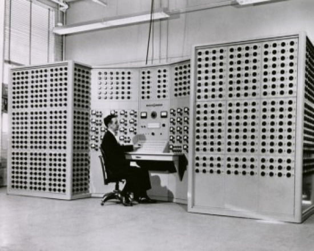 Posterazzi Technician determining means and output of electricity on an electronic power plant computer Canvas Art - (24 x 36)
