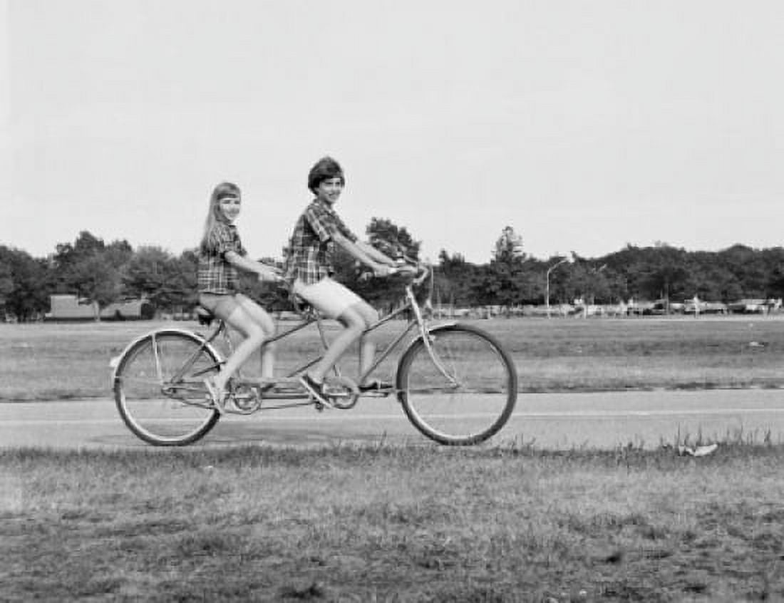 Posterazzi Teenage boy and teenage girl riding a tandem bicycle Canvas Art - (24 x 36)
