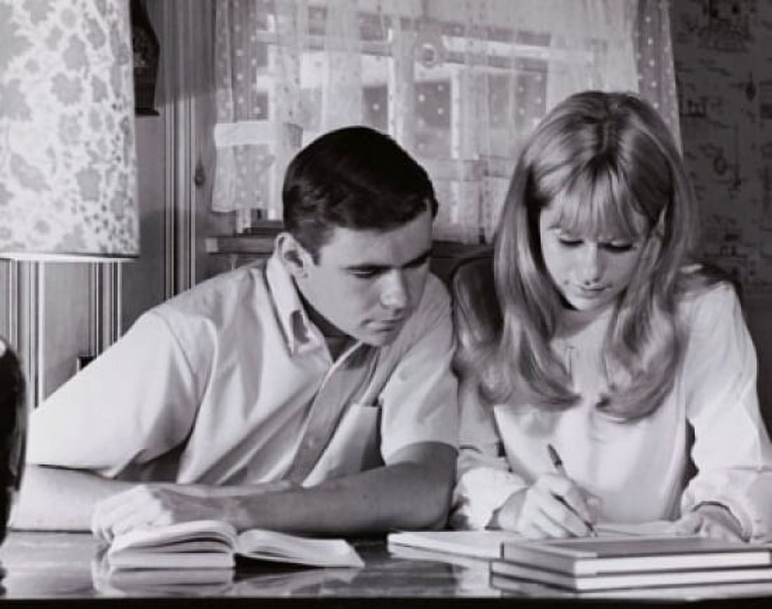 Posterazzi Teenage couple studying Canvas Art - (24 x 36)