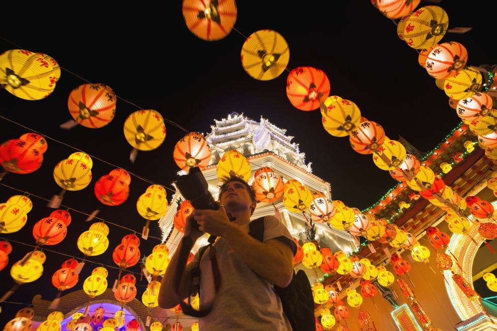Posterazzi The fantastic lighting of Kek Lok Si Temple and a tourist with a camera Penang Malaysia Canvas Art - Micah Wright Design Pics (36 x 24)