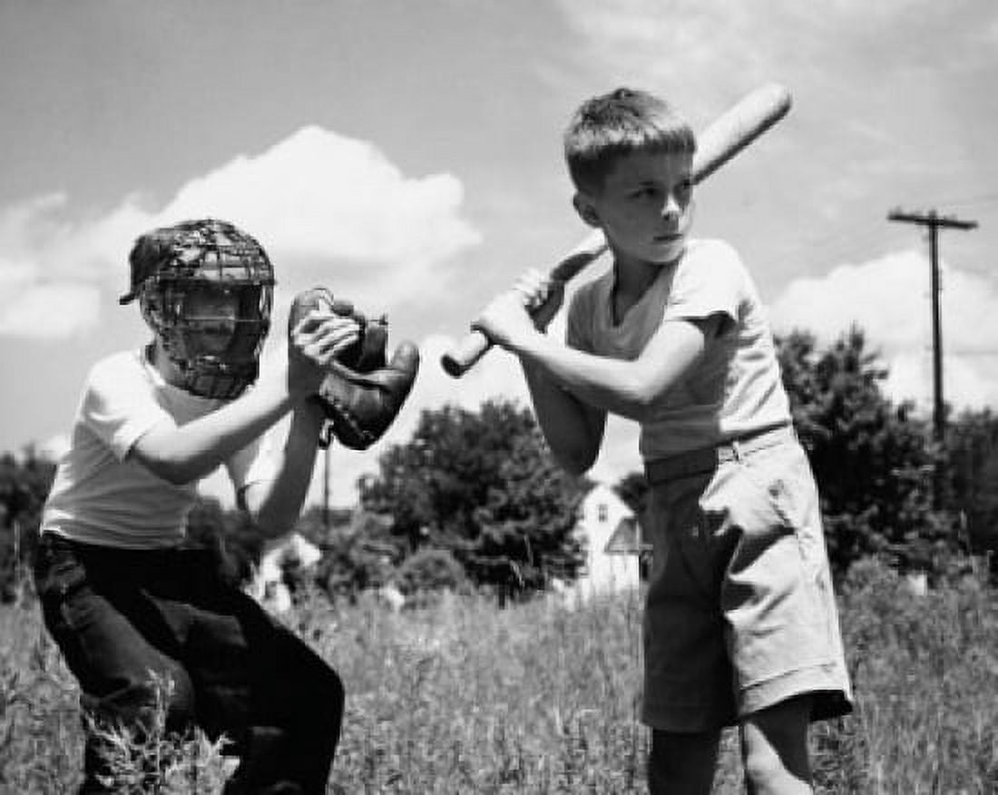 Posterazzi Two boys playing baseball in field Canvas Art -  (24 x 36)