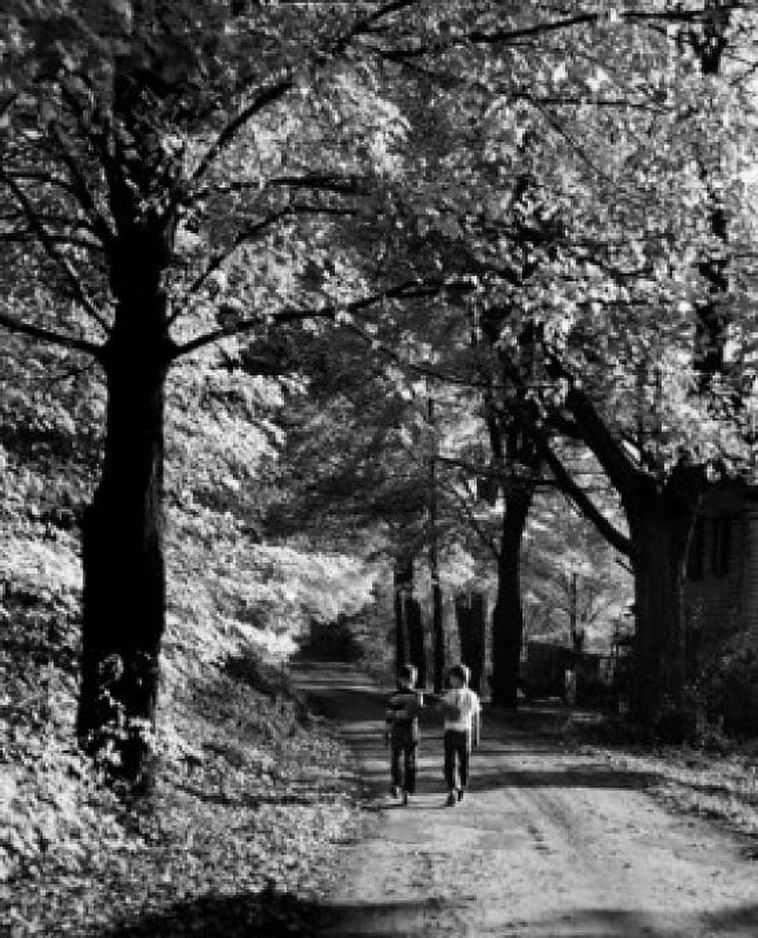 Posterazzi Two boys walking on dirt road Canvas Art -  (24 x 36)