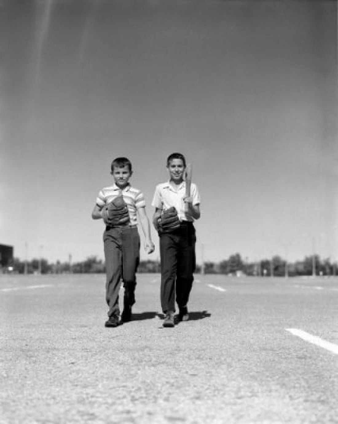 Posterazzi Two boys with baseball glove and bat waling on parking lot Canvas Art - (24 x 36)