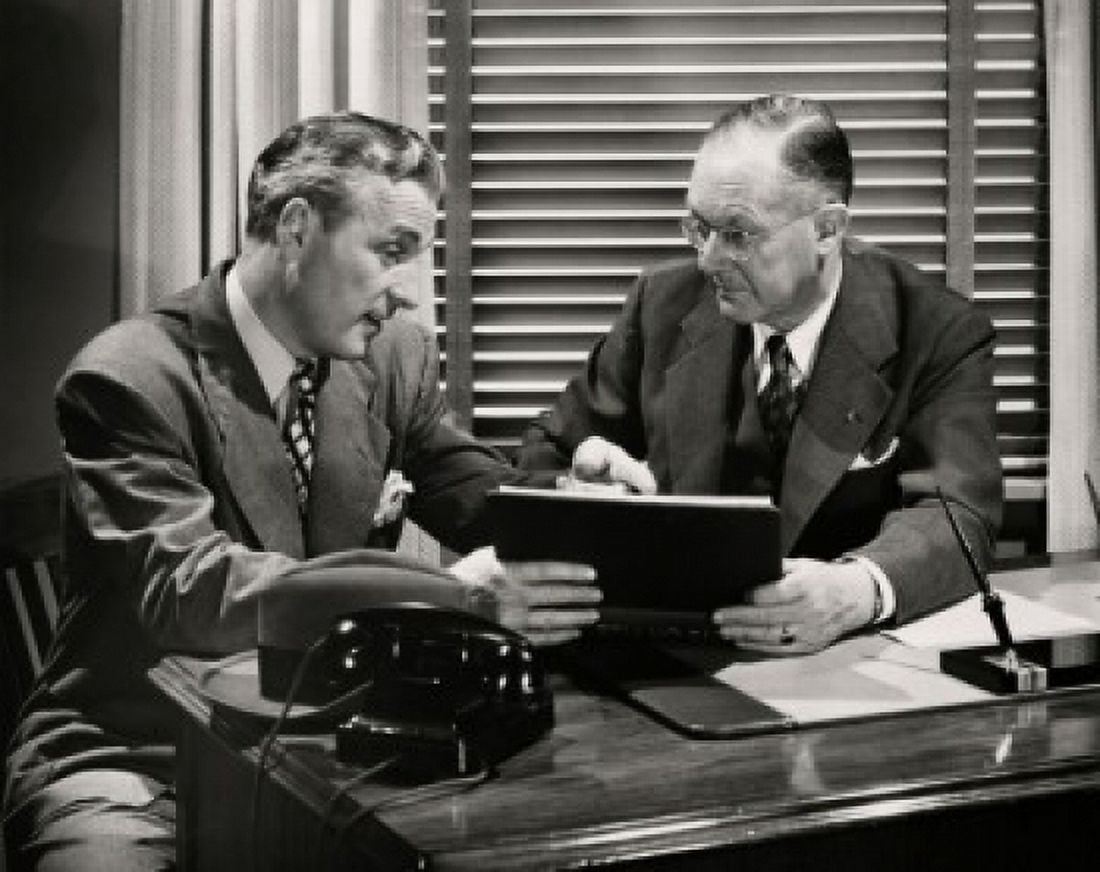 Posterazzi Two businessmen talking in an office Canvas Art -  (24 x 36)