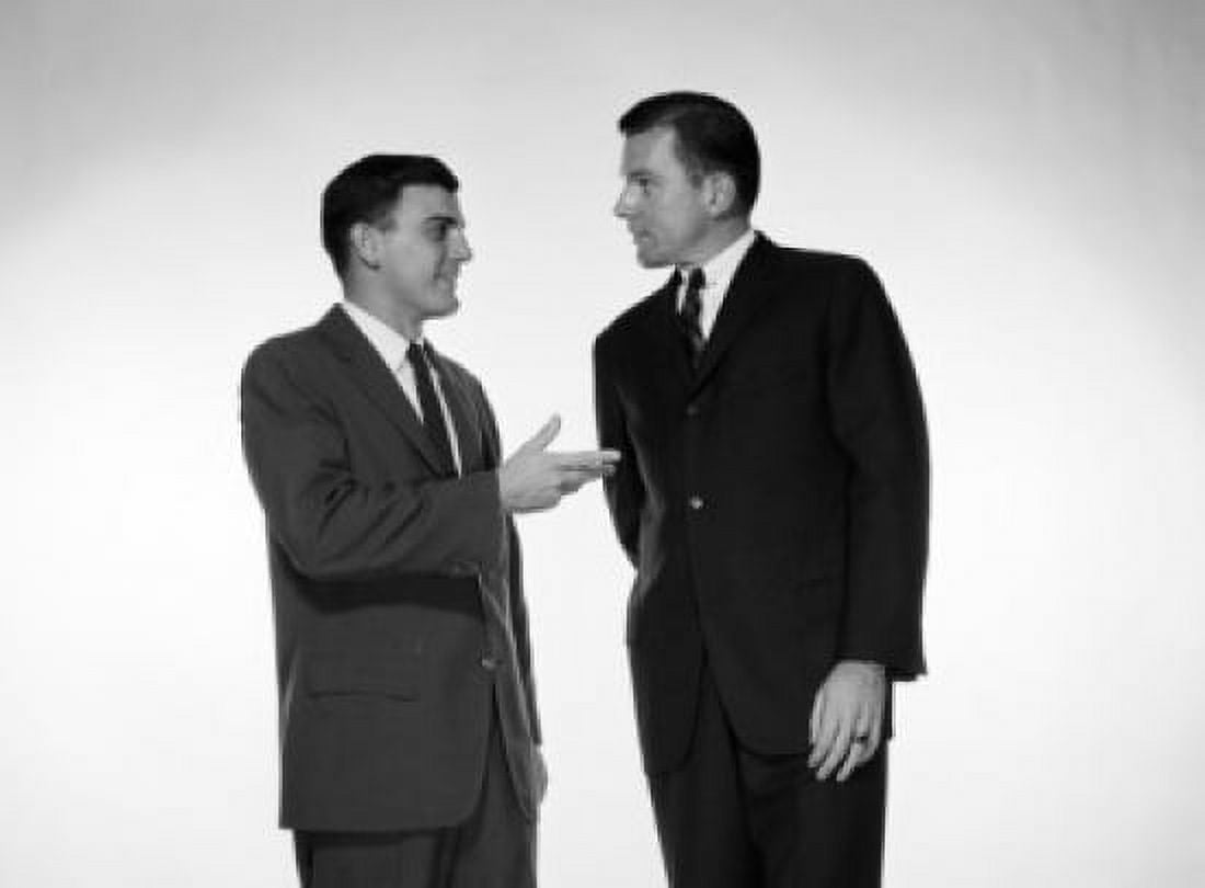 Posterazzi Two businessmen talking to each other Canvas Art - (24 x 36)